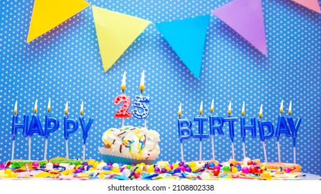 Word From The Letters Of Happy Birthday Candles For Twenty-five Years. Copy Space Happy Birthday Greetings For 25 Years, Lit Candles With Holiday Decorations. Beautiful Holiday Card