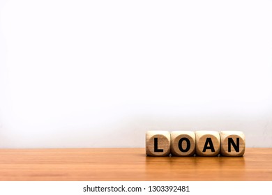 Word Loan cube wood on wooden table white background. 
Financial money loans contract agreement. copy space. - Shutterstock ID 1303392481