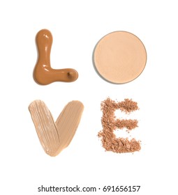 Word Love made from samples of foundation, concealer and powder