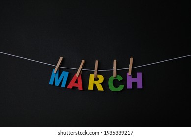 Word March On Black Background. March Is The Third Month Of The Year And Named After Mars In Both The Julian And Gregorian Calendars.