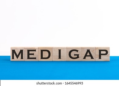 Word Medigap Made With Wood Building Blocks