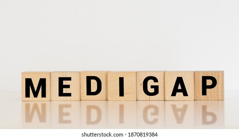 Word Medigap Made With Wood Building Blocks.