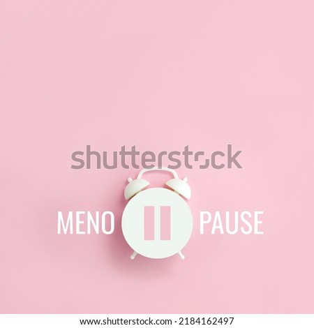 Word Menopause and pause sign on alarm clock on pink background. Minimal creative concept hormone replacement therapy. Сopy space, square orientation [[stock_photo]] © 