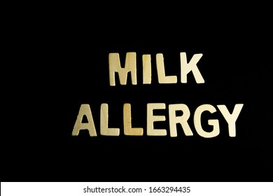 Word Milk Allergy On Black Background