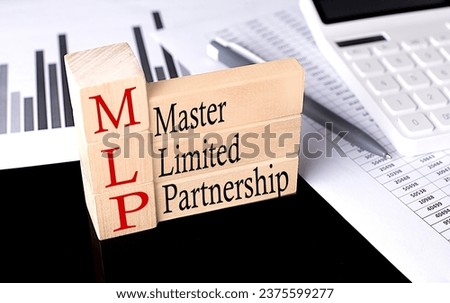 Word MLP - Master Limited Partnership made with wood building blocks, business