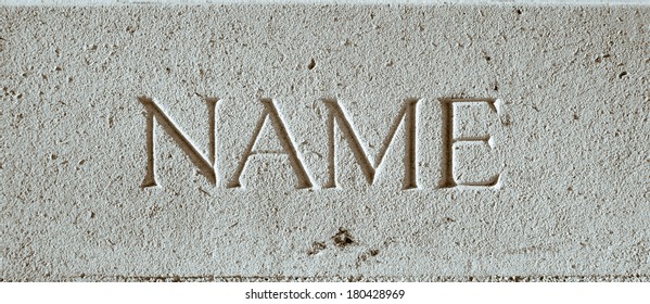 The Word Name Engraved In A Stone Surface