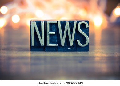 The word NEWS written in vintage metal letterpress type on a soft backlit background. - Shutterstock ID 290929343