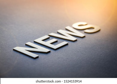 Word News Written With White Solid Letters On A Board