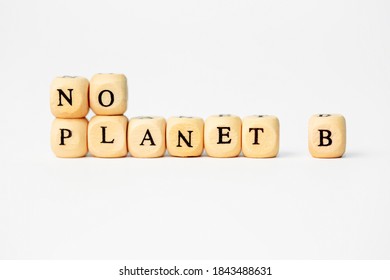 The word no planet b in wooden cube letters on white background isolated white background - Shutterstock ID 1843488631