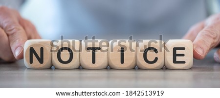 Word notice on wooden cubes