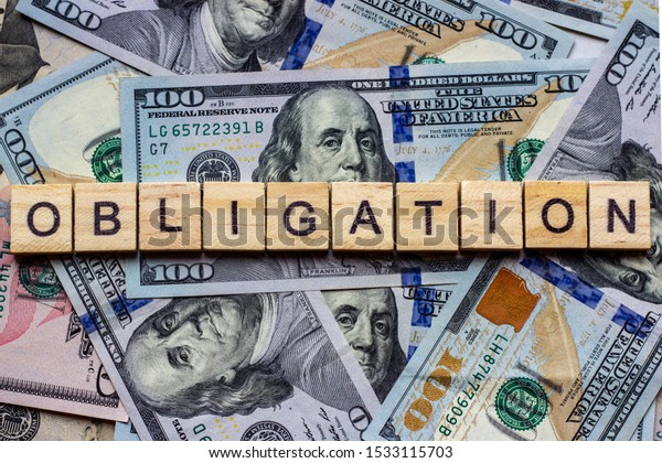 word-obligation-on-dollar-usa-background-stock-photo-1533115703