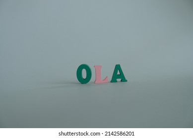 Word 'Ola' on white background. Ola is the word for Portuguese say Hello or greetings.