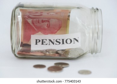 The Word Pension Is Shown In A Mason Jar With Canadian Coins And A Fifty Dollar Bill