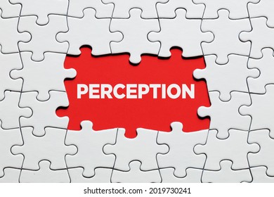 The word perception surrounded by jigsaw puzzle. To increase or expand the realm of perception concept.