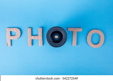 Word PHOTO made from cardboard letters on a blue background made photo from top with lens. High definition. - Shutterstock ID 542272549