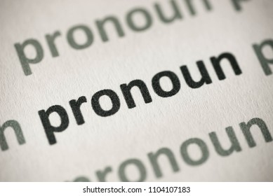 Word Pronoun Printed On White Paper Macro