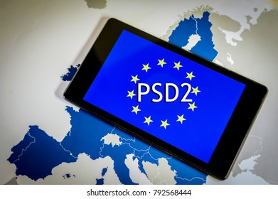 Word PSD2 on smartphone screen over a Eu map. Financial concept symbolizing Payment Services Directive 2 which will apply as of 13 January 2018. - Shutterstock ID 792568444