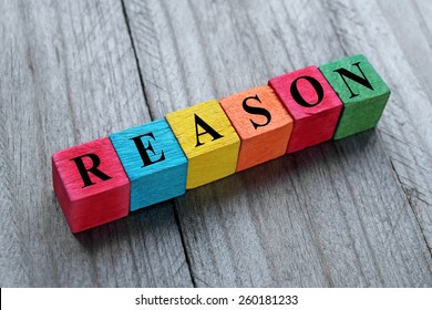 Word Reason On Colorful Wooden Cubes