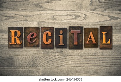 The word "RECITAL" written in vintage wooden letterpress type.