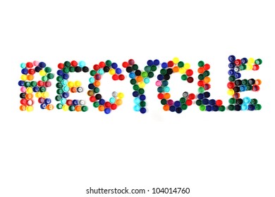 Word Recycle From Plastic Caps Isolated On The White Background