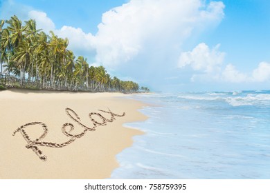 Word Relax handwritten on the sand of beautiful tropical beach - Shutterstock ID 758759395