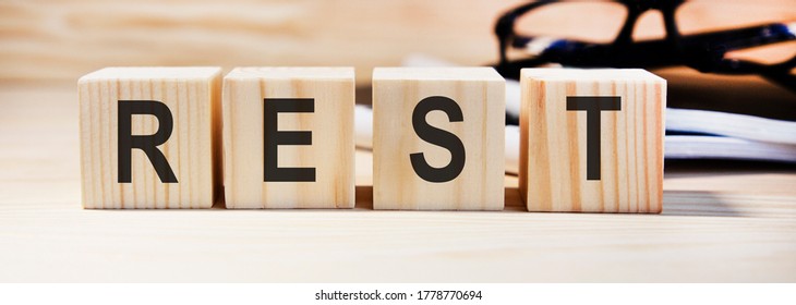 the word REST of on wooden cubes - Shutterstock ID 1778770694