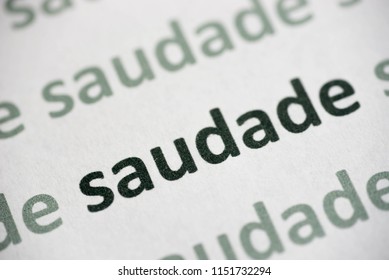 Word Saudade Printed On White Paper Macro