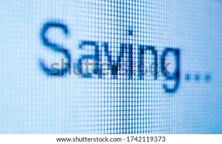 Word Saving on the pixelated computer screen. Saving the file. Process of saving.