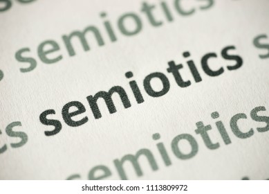 Word Semiotics  Printed On White Paper Macro