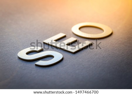Word SEO written with white solid letters on a board