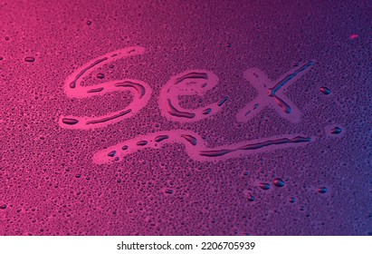 Word - Sex,Handwritten Text On Wet Glass,Water Drops On The Window Glass