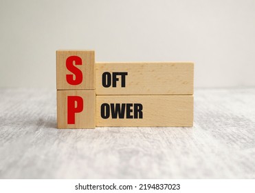 Word Soft Power On Wooden Blocks And Wooden Background