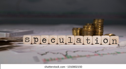 Word SPECULATION composed of wooden letter. Stacks of coins in the background. Closeup - Shutterstock ID 1310002150