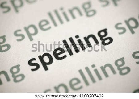 word spelling printed on white paper macro