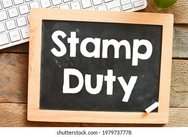 The word stamp duty written on a chalk board. - Shutterstock ID 1979737778