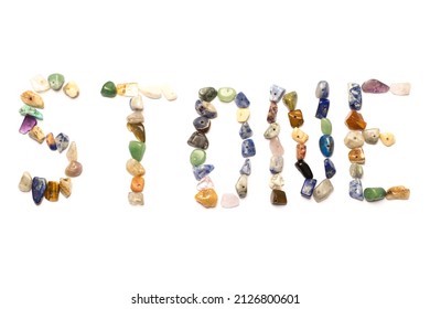 Word stone made of colorful small rock beads isolated on white background