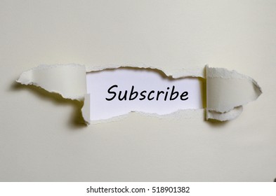 The word subscribe appearing behind torn paper