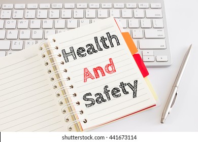 Word Text Health And Safety On White Paper Card On Office Table / Business Concept