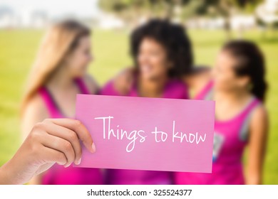 The Word Things To Know And Hand Holding Card Against Three Laughing Runners Supporting Breast Cancer Marathon