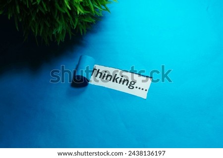 Word thinking written on a paper