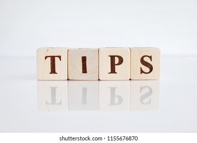 4 Tip. Word Written On Wooden Blocks On A Brown Background. Images ...
