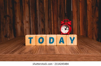 The word today. The word today written in english language on wooden blocks with a red clock in the image composition. Close-up photo. Concepts of starting projects, achieving success and doing now. - Shutterstock ID 2114245484