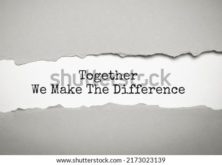 The word TOGETHER WE MAKE THE DIFFERENCE appearing behind torn brown paper.