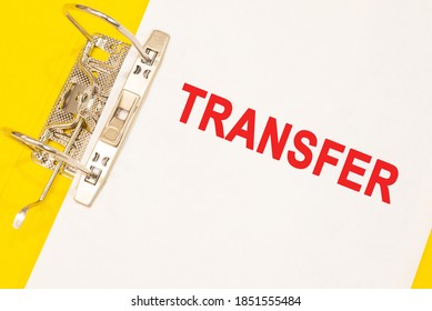 The word transfer on a white background with a yellow folder. Business concept