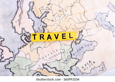 the word travel on a map