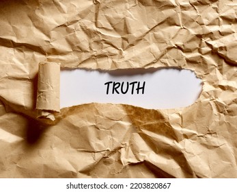The word truth written under a brown torn paper. To reveal, expose, discover or display the hidden underlying truth concept.