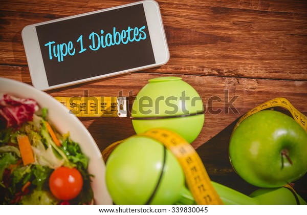 The word type 1 diabetes against phone on healthy\
persons desk