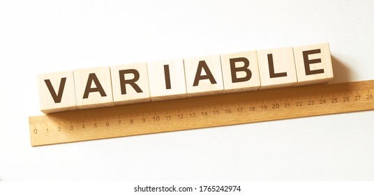 Word VARIABLE made with wood building blocks