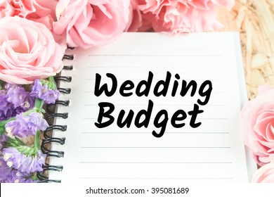 Word Wedding Budget On Note Paper Pink Flower Background