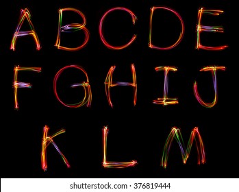 Word Writing From Light On The Black Background.